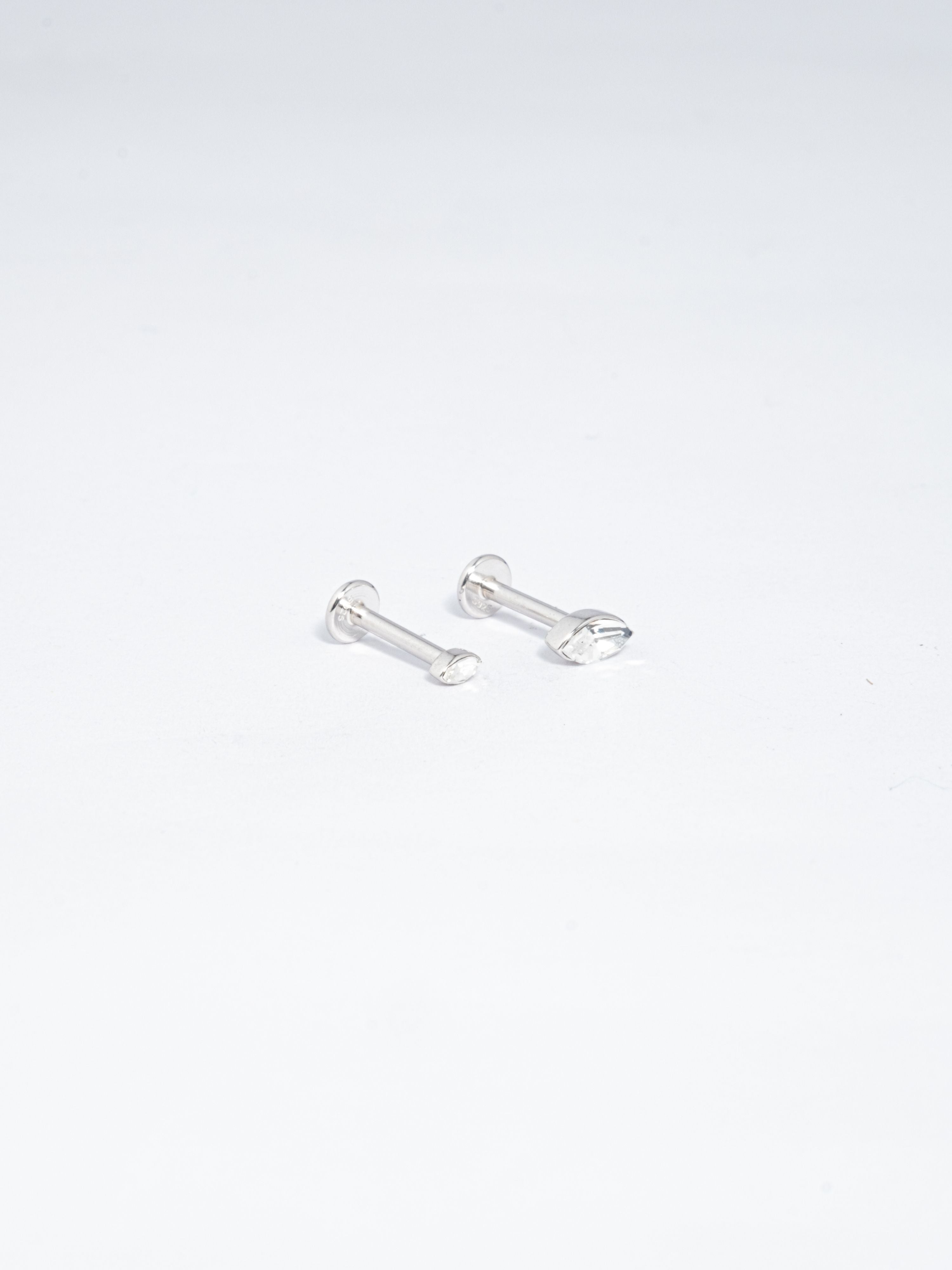 Piercing 6 black zircons