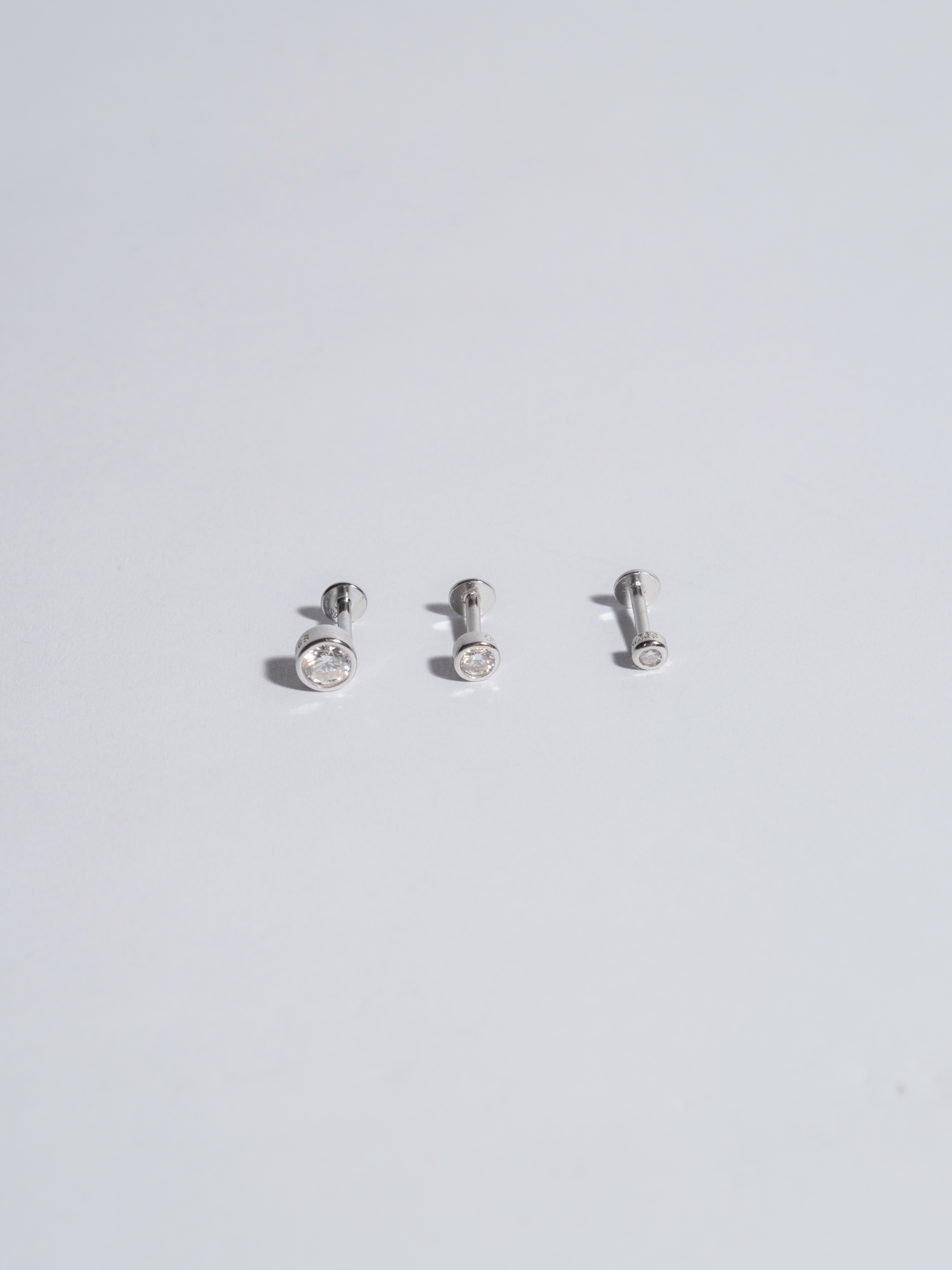 Piercing 6 black zircons