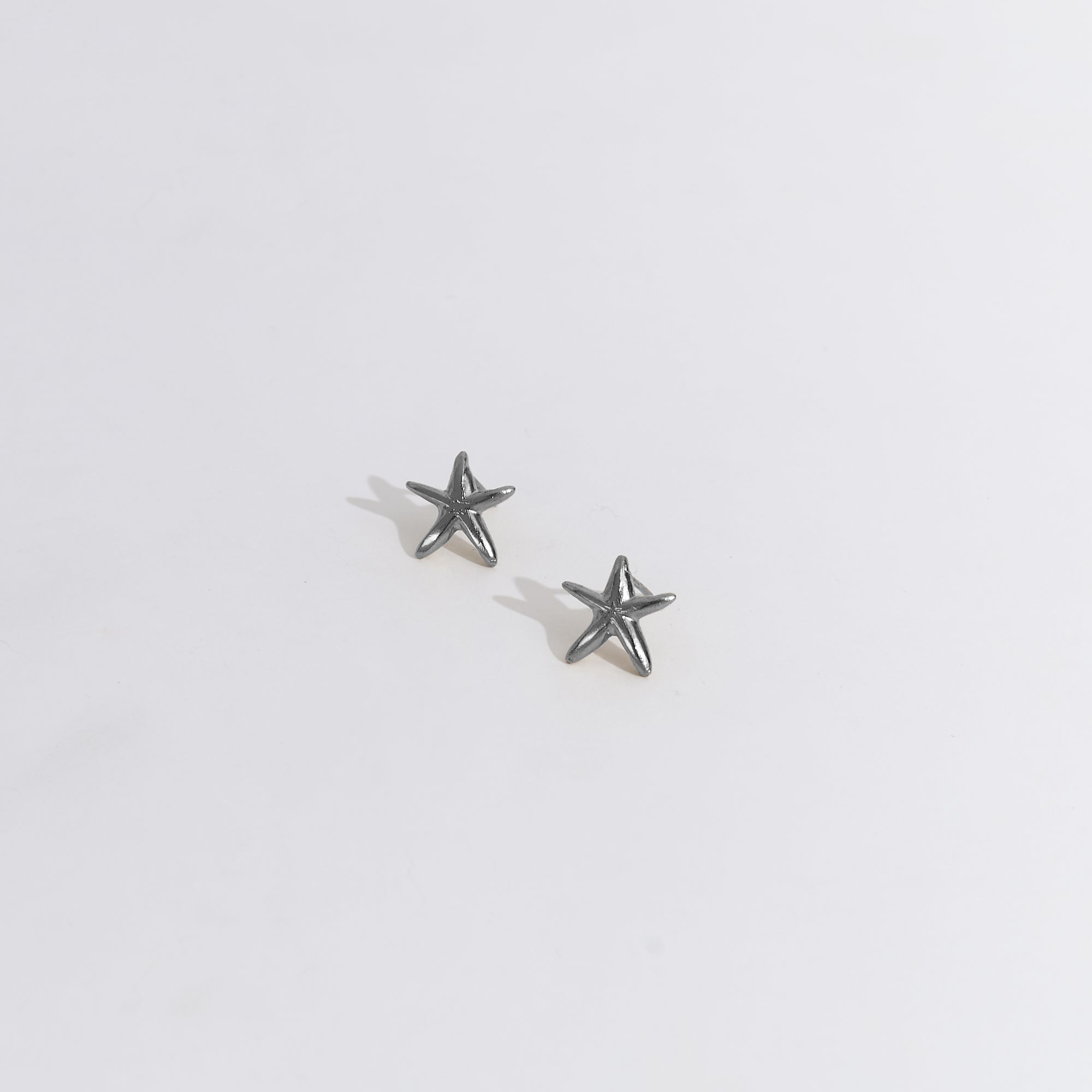 Aretes Una estrella de mar mini plateado