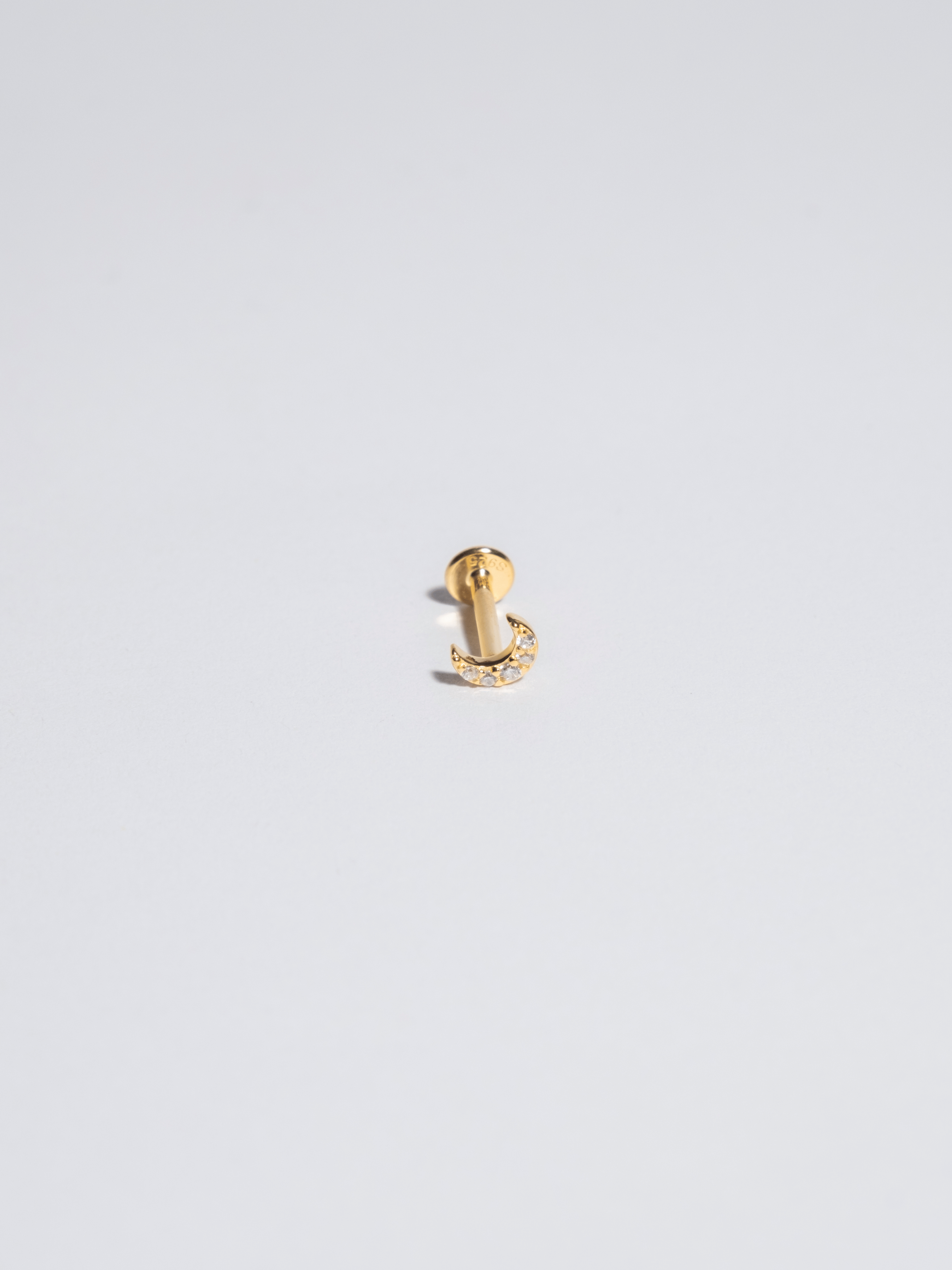 Piercing 6 black zircons