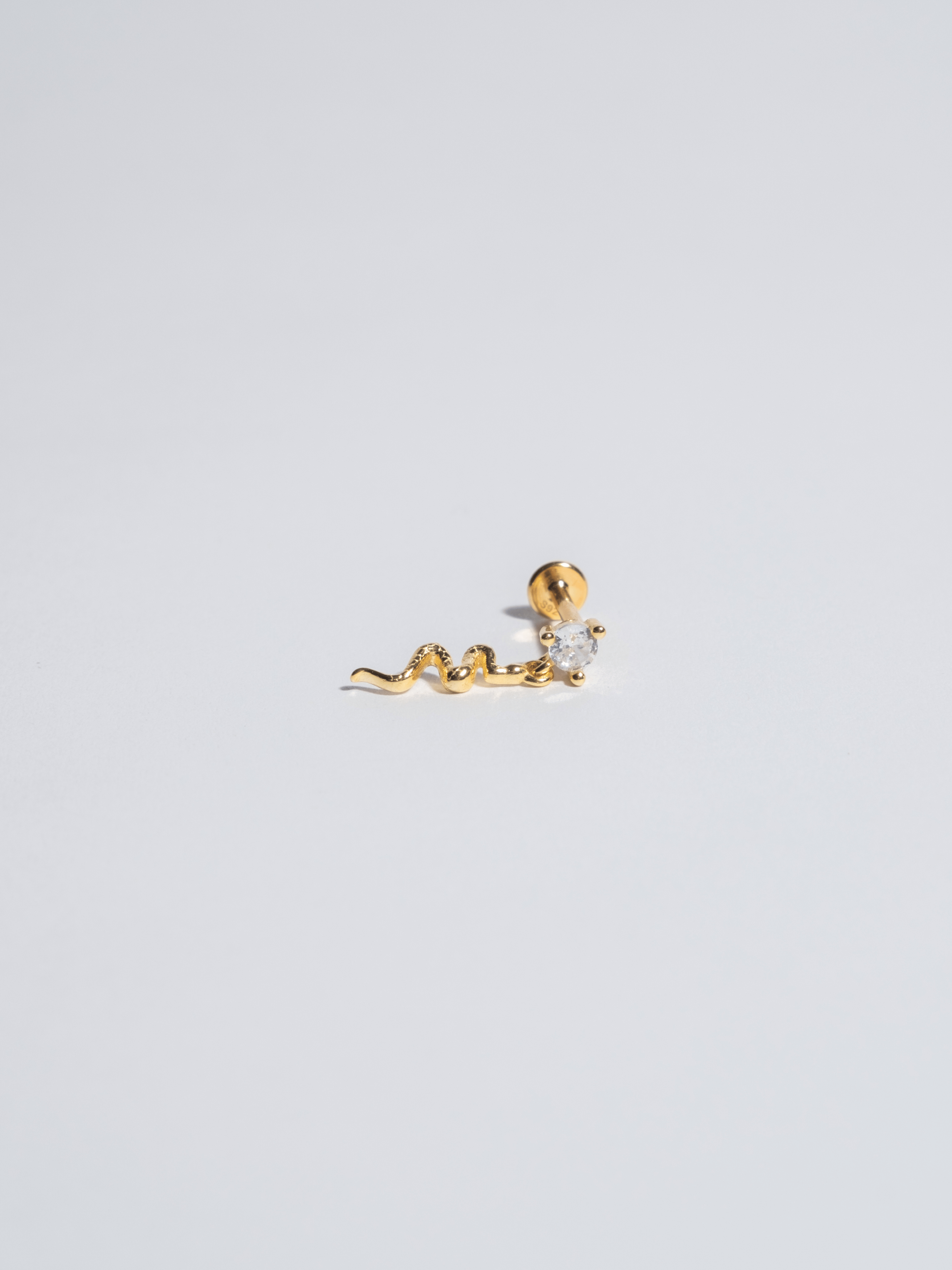 Piercing 6 black zircons