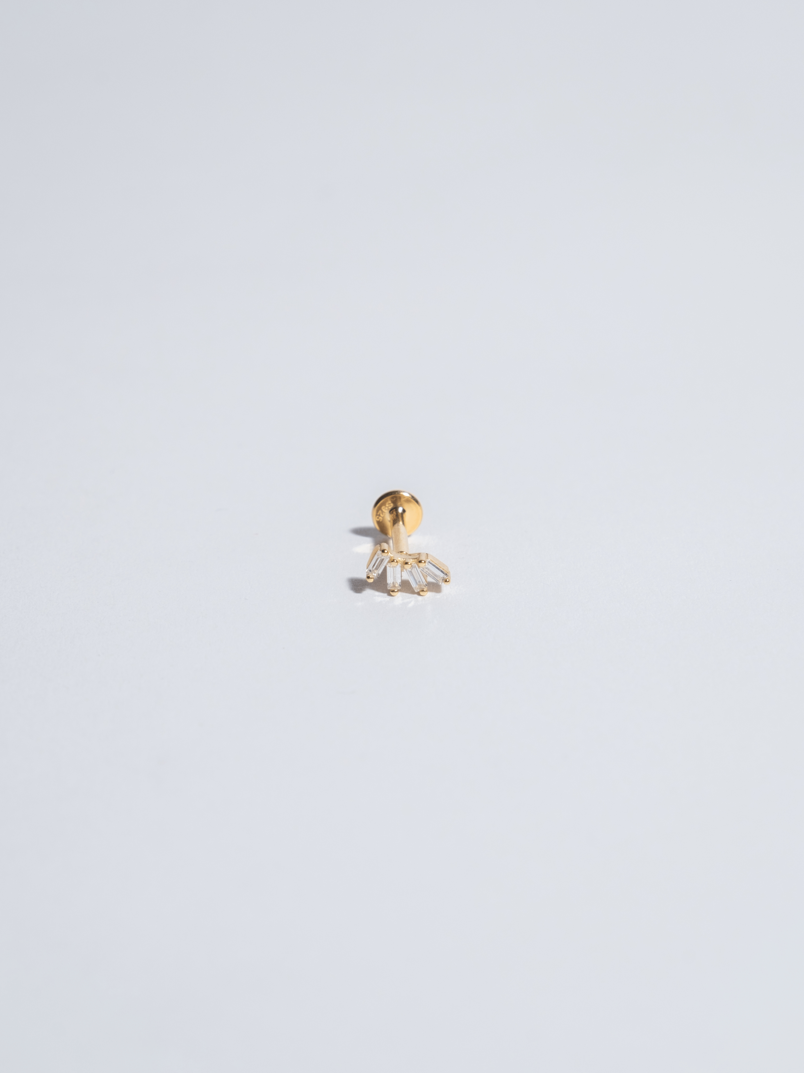 Piercing 6 black zircons