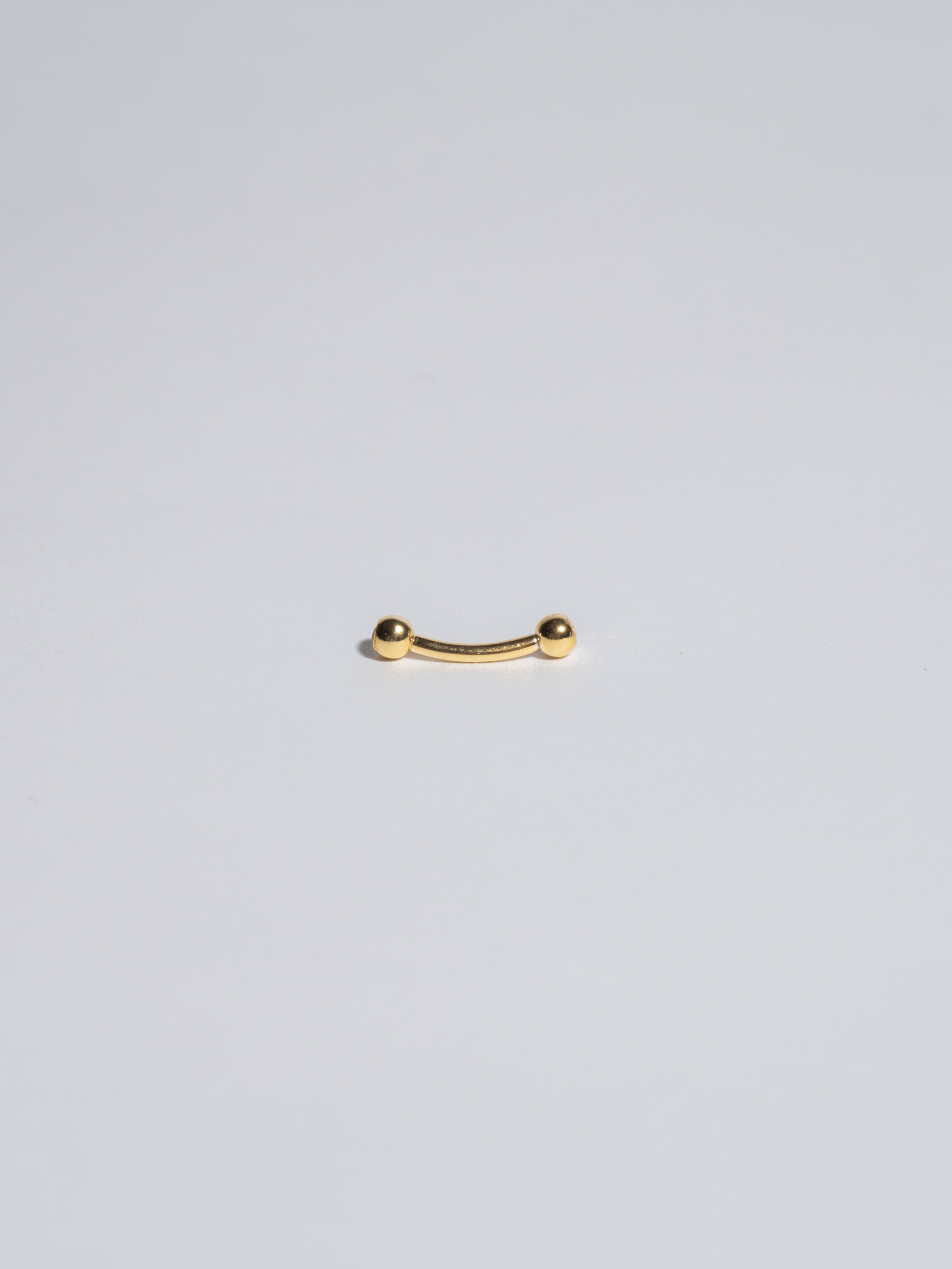 Piercing 6 black zircons