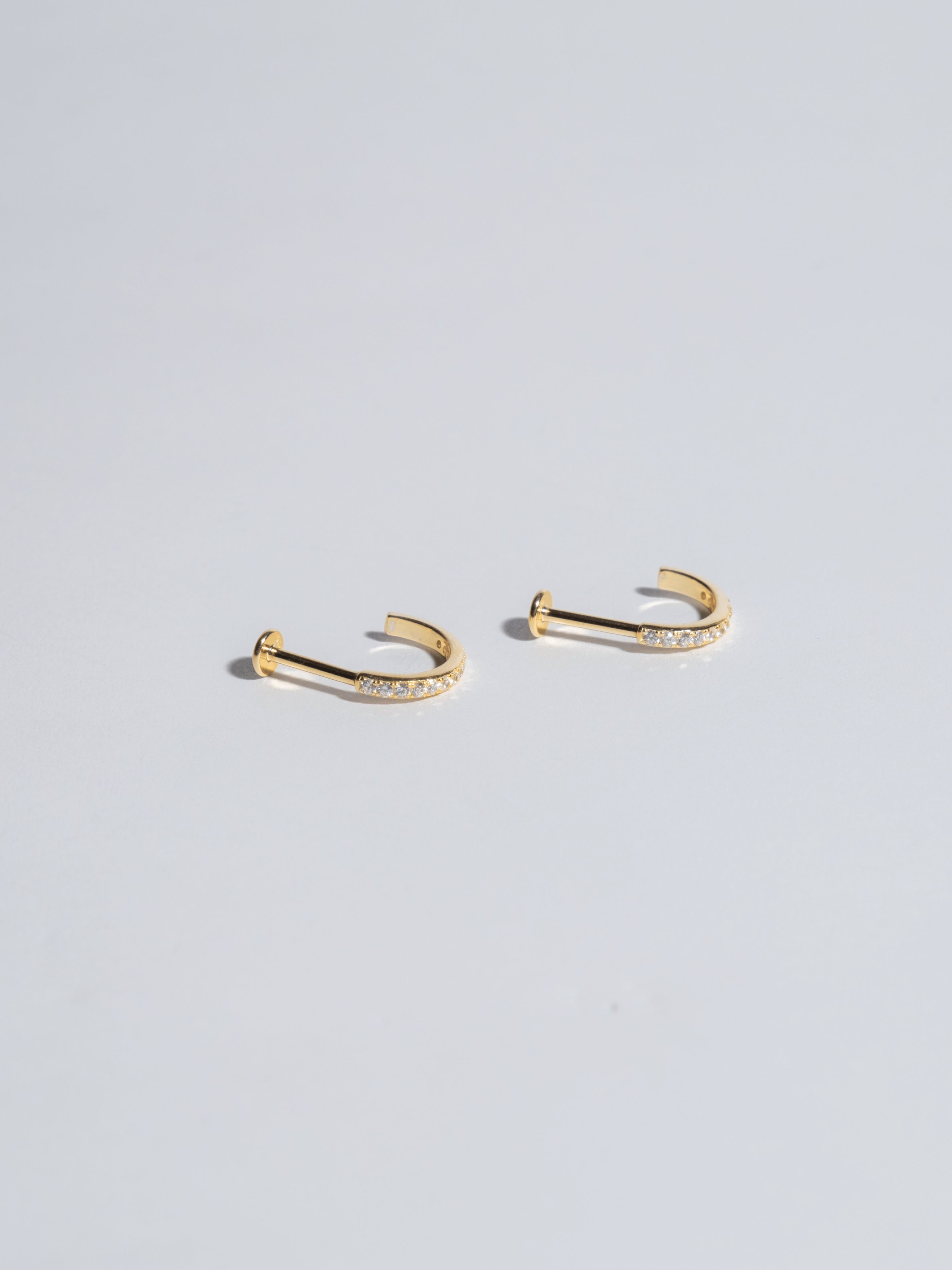 Piercing 6 black zircons