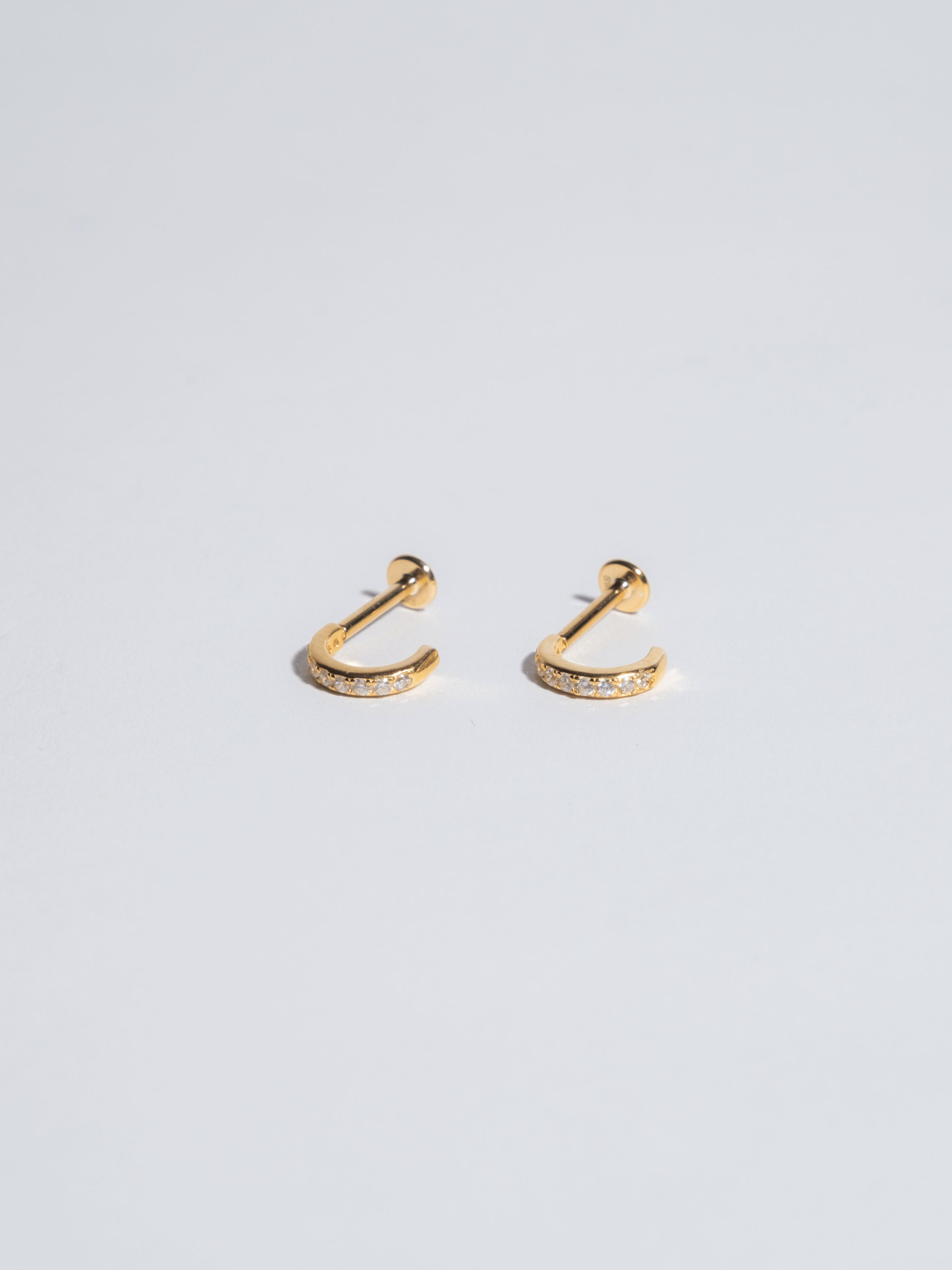 Piercing 6 black zircons
