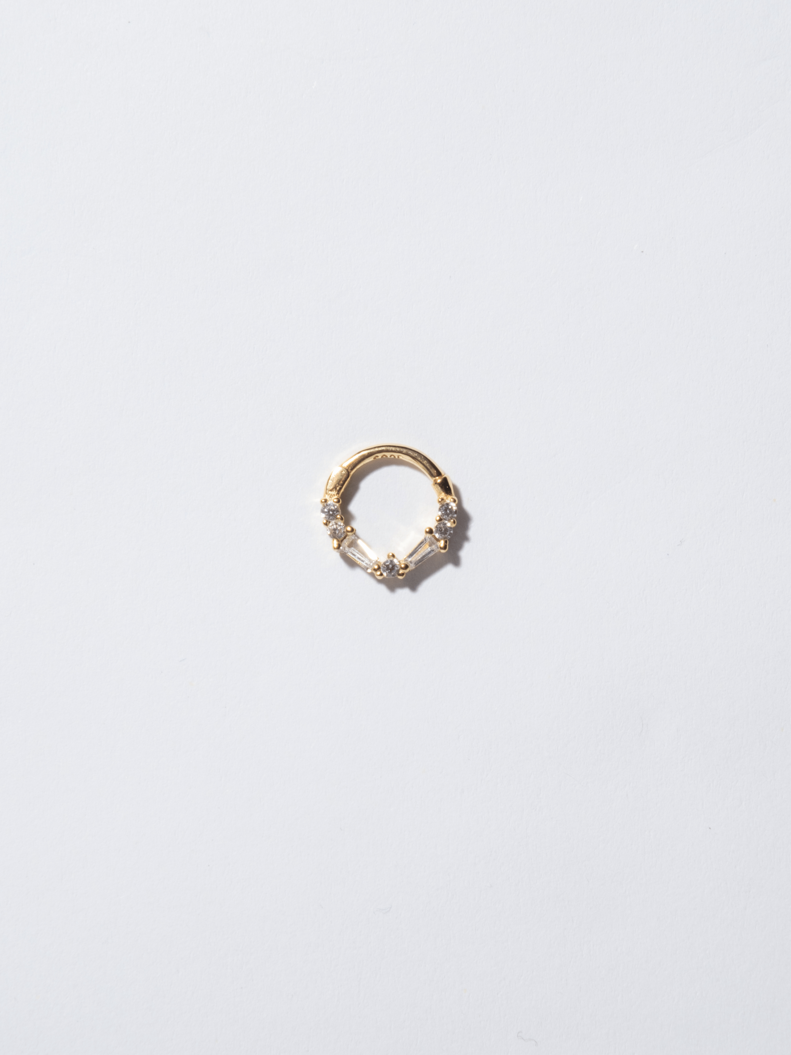 Piercing 6 black zircons